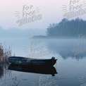 Serene Misty Lake with Abandoned Boat at Dawn