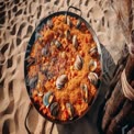 Delicious Seafood Paella on Sandy Beach: Culinary Delight and Summer Vibes