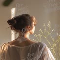 Serene Woman in Natural Light with Delicate Flowers