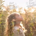 Child Wondering in Nature: Captivating Portrait of a Girl Gazing at the Sky