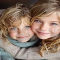 Joyful Siblings Embracing: Heartwarming Childhood Bond with Bright Smiles