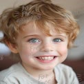 Joyful Child Portrait with Bright Blue Eyes and Curly Hair