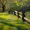 Serene Countryside Landscape with Rustic Wooden Fence and Lush Green Grass