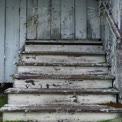 Weathered Wooden Stairs with Peeling Paint: Rustic Charm and Vintage Aesthetic