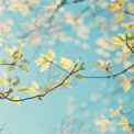 Fresh Spring Leaves Against a Soft Blue Sky - Nature Background