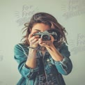 Passionate Photographer Capturing Moments with Vintage Camera