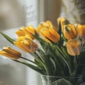 Vibrant Yellow Tulips in a Glass Vase - Fresh Floral Arrangement for Home Decor