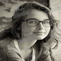 Natural Beauty: Portrait of a Young Woman with Glasses in Soft Light