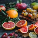 Fresh and Colorful Assortment of Seasonal Fruits on Rustic Wooden Table