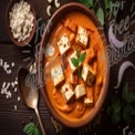 Delicious Paneer Butter Masala with Fresh Herbs and Spices