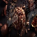 Decadent Chocolate Ice Cream with Nuts and Toppings on Dark Background