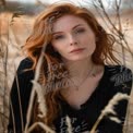 Natural Beauty Portrait: Redhead Woman in Nature with Soft Focus