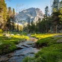 Serene Mountain Landscape with Stream and Lush Greenery