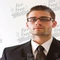 Confident Business Professional in Suit with Glasses