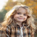 Joyful Child Portrait in Autumn Nature with Soft Bokeh Background