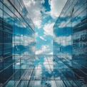 Modern Urban Architecture: Glass Buildings Reflecting Blue Sky and Clouds