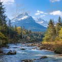 Serene Mountain Landscape with Clear River and Lush Forest in Autumn