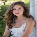 Natural Beauty: Portrait of a Young Woman in a Serene Outdoor Setting