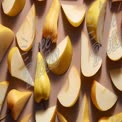 Fresh Yellow Pears and Slices on Soft Background - Healthy Eating and Culinary Inspiration