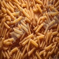 Close-Up of Raw Penne Pasta: Culinary Ingredients for Italian Dishes