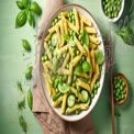 Fresh Basil Pesto Pasta with Peas and Zucchini - Healthy Italian Cuisine