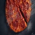 Delicious Pepperoni Pizza Slice with Melted Cheese on Dark Background