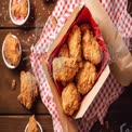 Crispy Fried Chicken in Takeout Box with Red Checkered Tablecloth