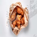 Freshly Baked Croissants in Rustic Paper Bag - Gourmet Bakery Delight