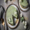 Delicious Matcha Cheesecake with Fresh Flowers and Elegant Presentation