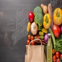 Fresh Organic Vegetables and Grocery Bag on Wooden Table