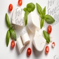 Fresh Mozzarella with Cherry Tomatoes and Basil Leaves - Healthy Italian Ingredients