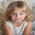 Charming Portrait of a Young Girl with Blue Eyes and Natural Beauty