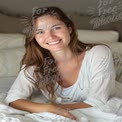 Natural Beauty: Smiling Young Woman in Cozy Bedroom Setting