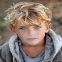 Captivating Portrait of a Young Boy with Freckles and Striking Blue Eyes