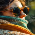 Cozy Autumn Fashion: Woman in Sunglasses and Colorful Scarf