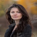 Confident Woman Portrait in Nature with Autumn Background