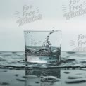 Refreshing Splash: Crystal Clear Water in Glass with Droplets