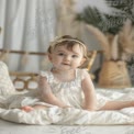 Adorable Baby Girl in White Dress: Cute Child Portrait for Family and Lifestyle Themes