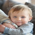 Adorable Baby Smiling with Big Blue Eyes, Cozy Family Moment