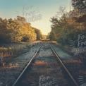 Serene Autumn Landscape with Abandoned Railway Tracks