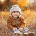 Joyful Child in Autumn Landscape: Cozy Sweater and Warm Smiles