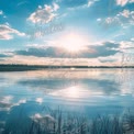 Tranquil Sunset Over Serene Lake with Reflective Water and Dramatic Clouds