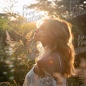 Golden Hour Serenity: Ethereal Portrait of a Woman in Nature