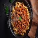 Delicious Homemade Pasta with Savory Meat Sauce and Fresh Vegetables