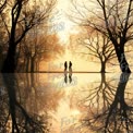 Serene Autumn Stroll: Silhouetted Figures Reflecting in Tranquil Water