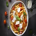 Delicious Penne Pasta with Cherry Tomatoes and Fresh Basil - Italian Cuisine