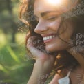 Radiant Smile in Nature: Joyful Woman with Sunlight Glow