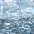 Close-Up of Water Droplets and Bubbles: Refreshing Liquid Texture