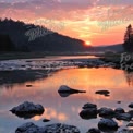 Serene Sunset Over Tranquil River: Nature's Reflection in Vibrant Colors