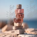 Balanced Stones on Beach: Symbol of Harmony and Stability